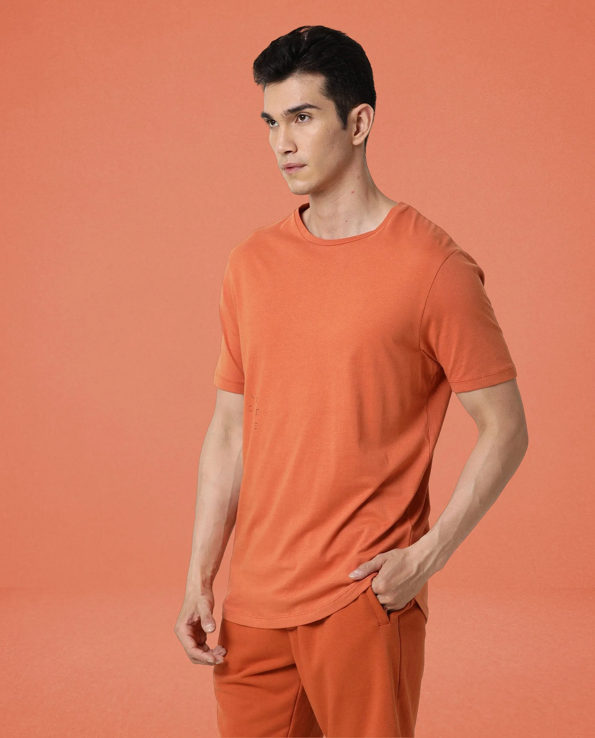 Rare Rabbit Articale Men's Caxel Tangy Orange Crew Neck Offset Brand Print Half Sleeves T-shirt