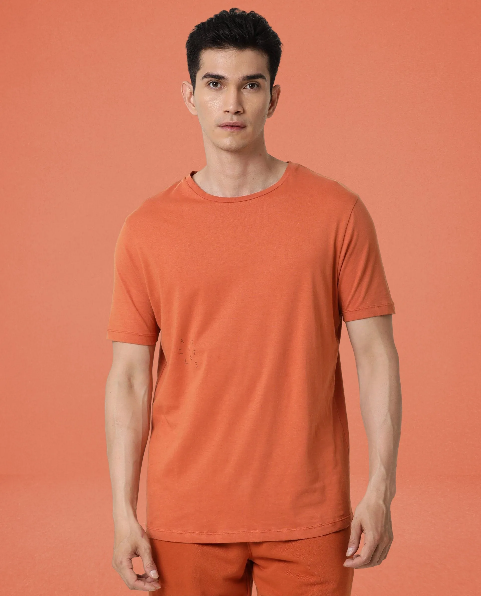 Rare Rabbit Articale Men's Caxel Tangy Orange Crew Neck Offset Brand Print Half Sleeves T-shirt