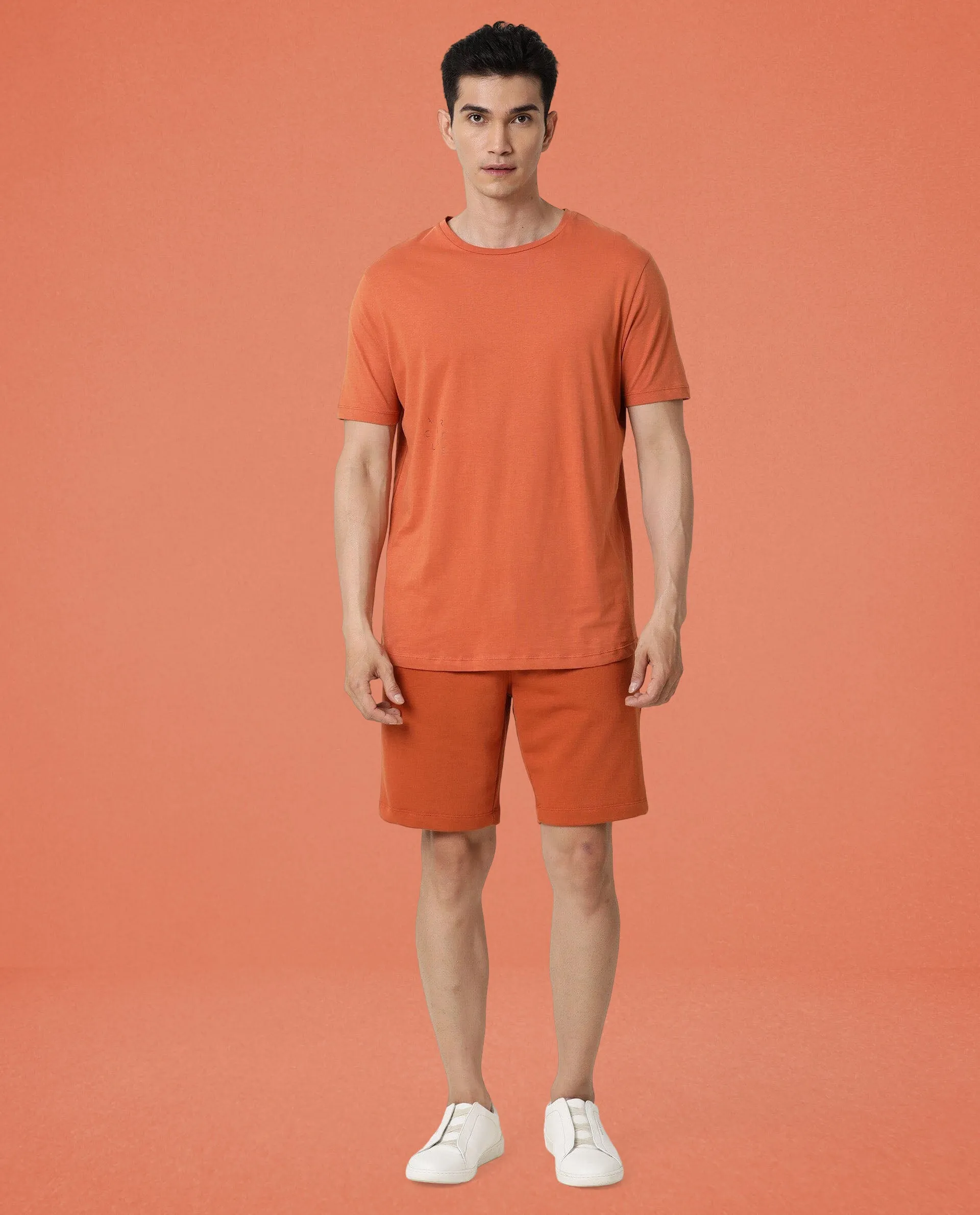 Rare Rabbit Articale Men's Caxel Tangy Orange Crew Neck Offset Brand Print Half Sleeves T-shirt