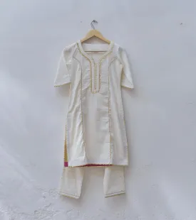 White kurta pant set.